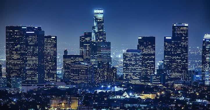 Nighttime city landscape featuring skyscrapers