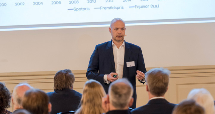 A man standing and speaking to an audience